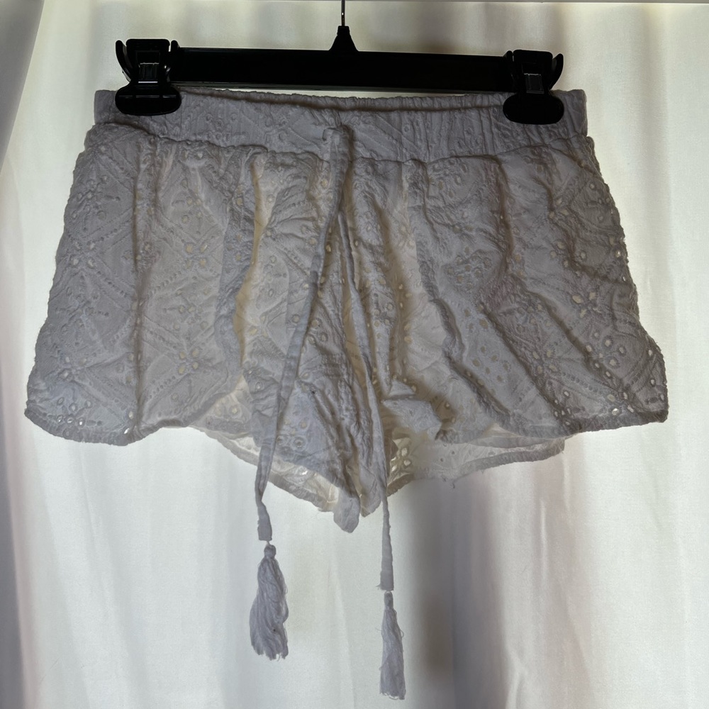 white flare shorts